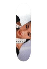 a skateboard with a woman's face on it